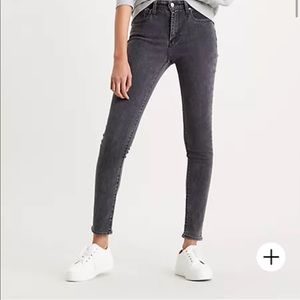 Levi’s Faded Black 721 High Rise Skinny Jeans